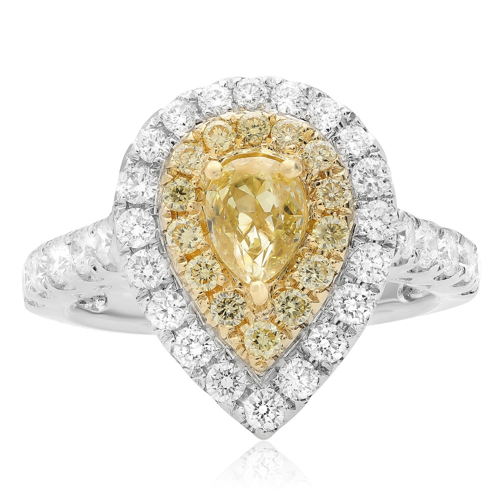 This stunning 18k two-tone piece features a yellow pear shaped center diamond surrounded by round yellow diamond and diamond accents.